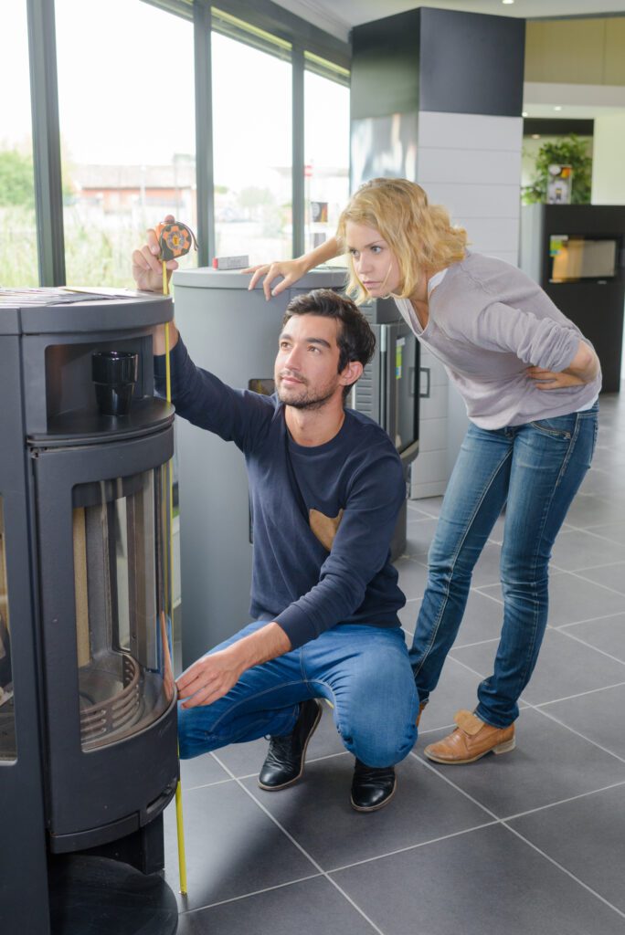 young couple trying to determine furnace age