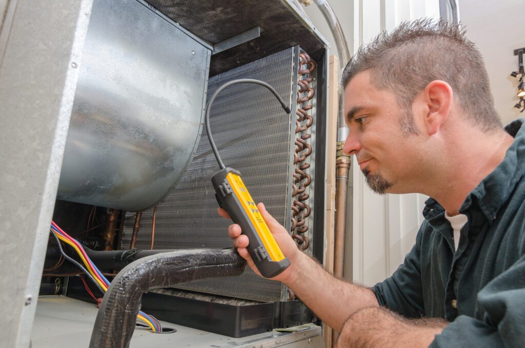 HVAC technician providing HVAC maintenance 